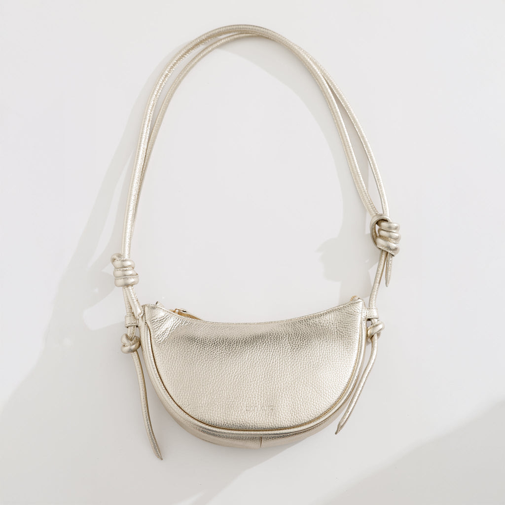 Mini Half Moon Shoulder Bag with Knots - Metallic Champagne - ann kurz
