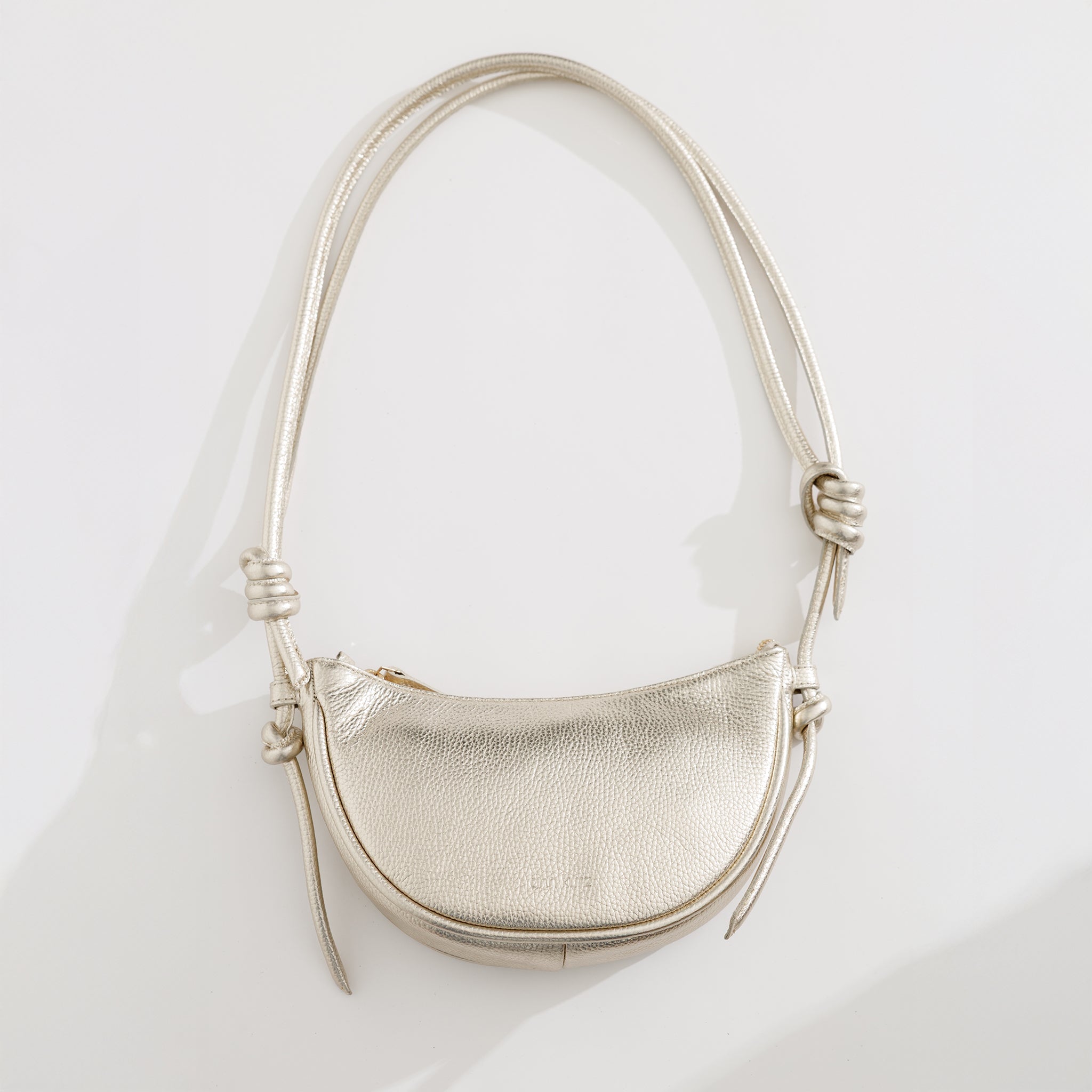 Mini Half Moon Shoulder Bag with Knots - Metallic Champagne - ann kurz
